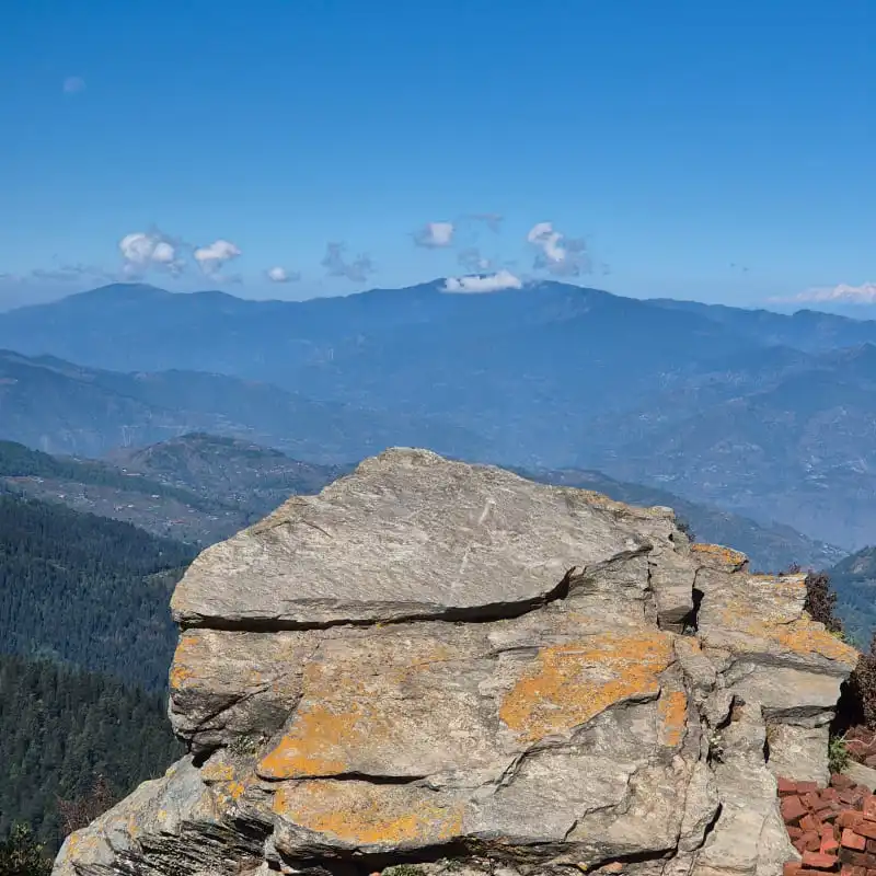 Biker-riding-from-Narkanda-to-Hatu-Peak-on-mountain-road.
